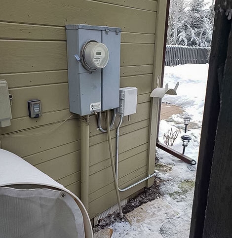 thermostat controller mounted next to power box