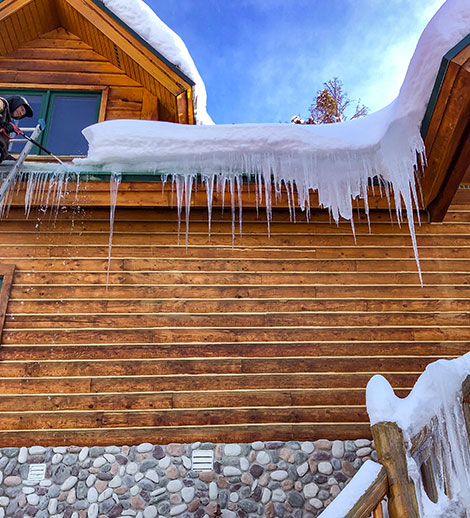 removing ice and snow from roofline